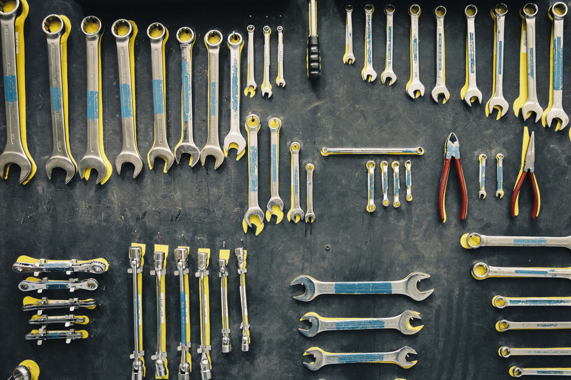 Wrenches and pliers hang up on a wall - tools for engineering courses in 糖心Vlog传媒